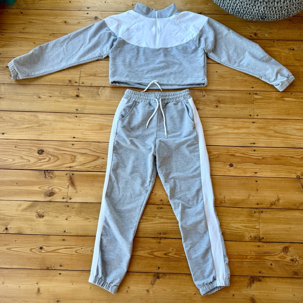 Gray and White Tracksuit Set with Drawstring ties on top and Bottom.